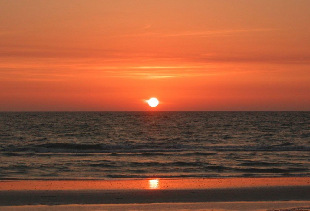 A beach sunset near our Panama City Beach vacation rentals