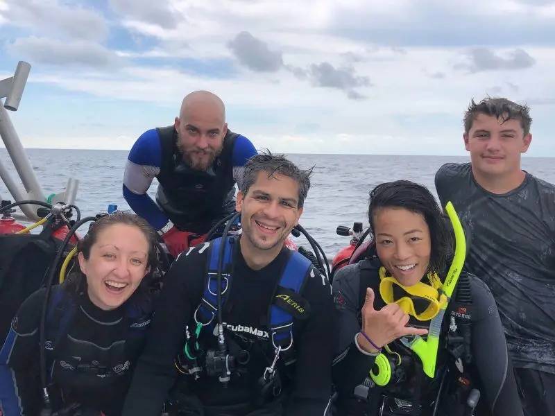 Family enjoying a scuba trip near our beautiful Panama City Beach, Florida,  vacation rentals.